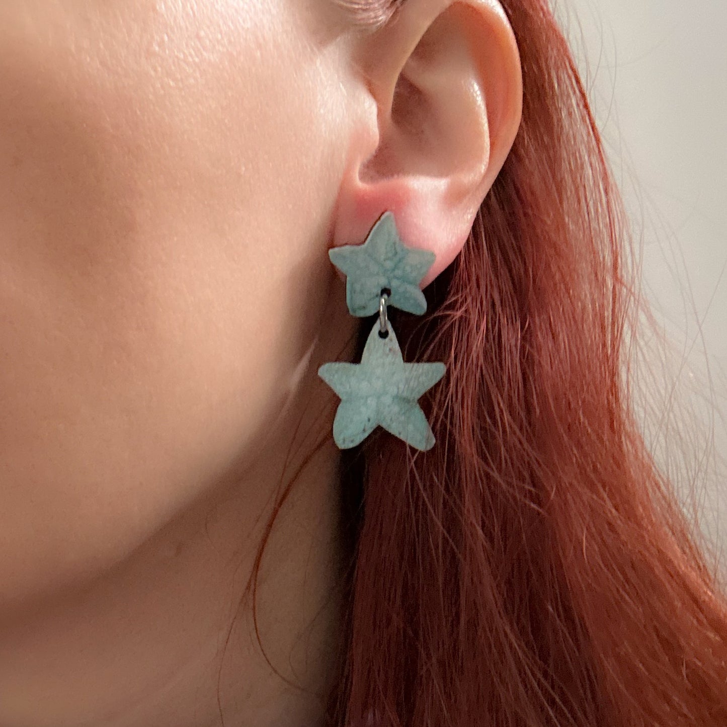 Meritähdet, nappikorvakoru