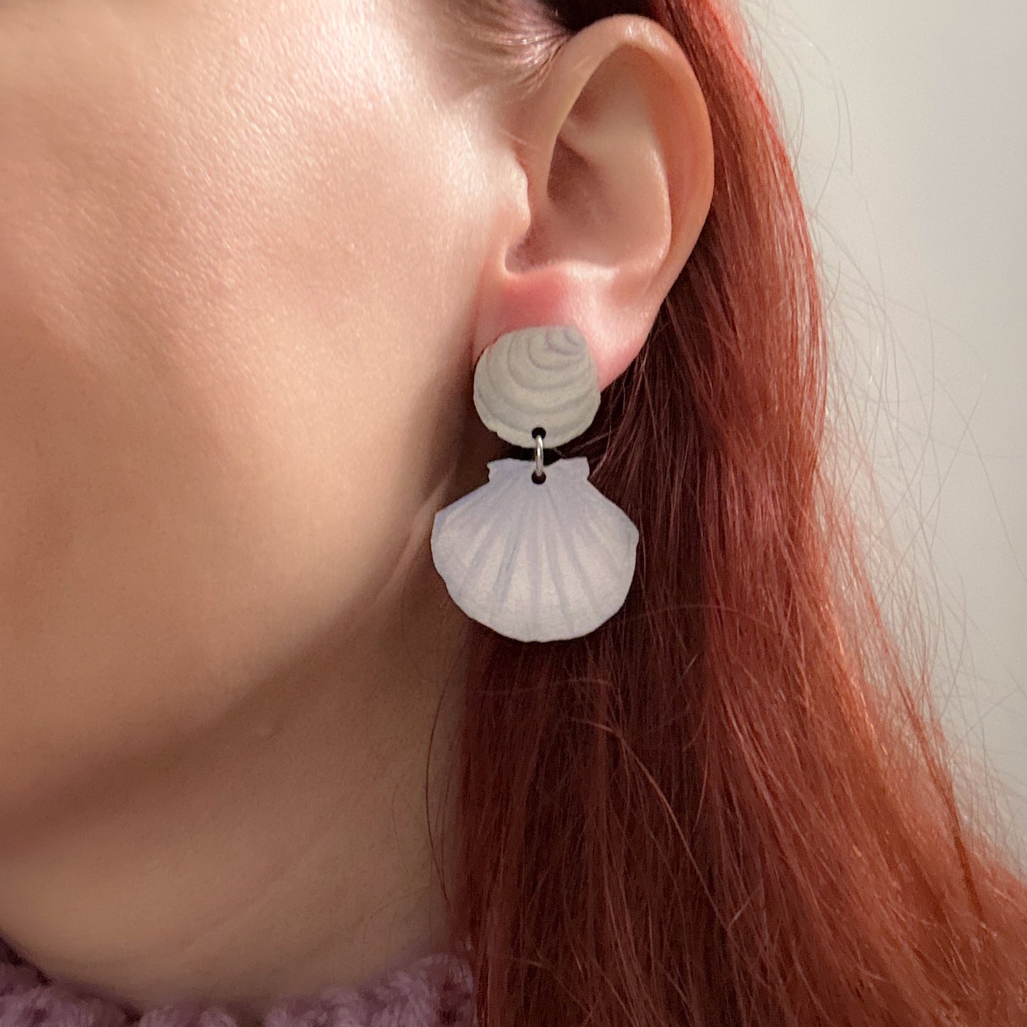 Simpukat, nappikorvakoru