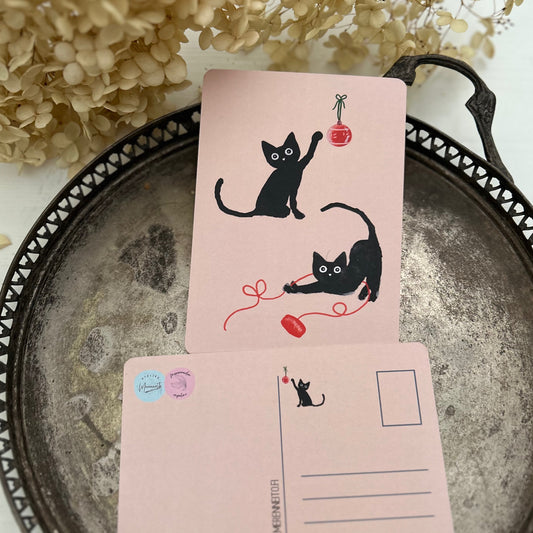 Kisujen joulupuuhat, postikortti