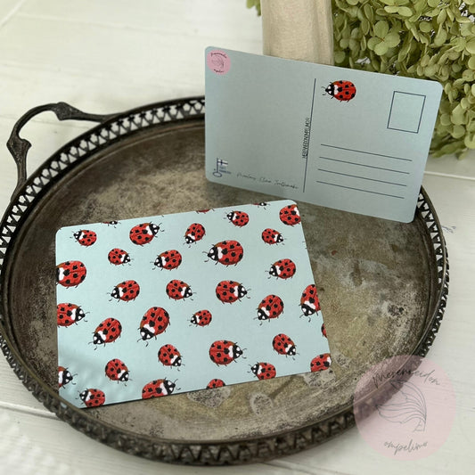 Leppäkertut, postikortti