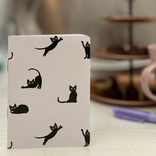 Mustan kissan tango, pikkuvihko