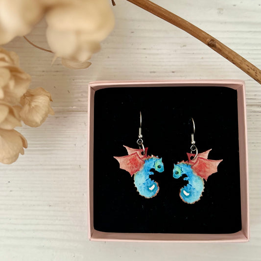 Lohikäärmeet, korvakoru koukulla